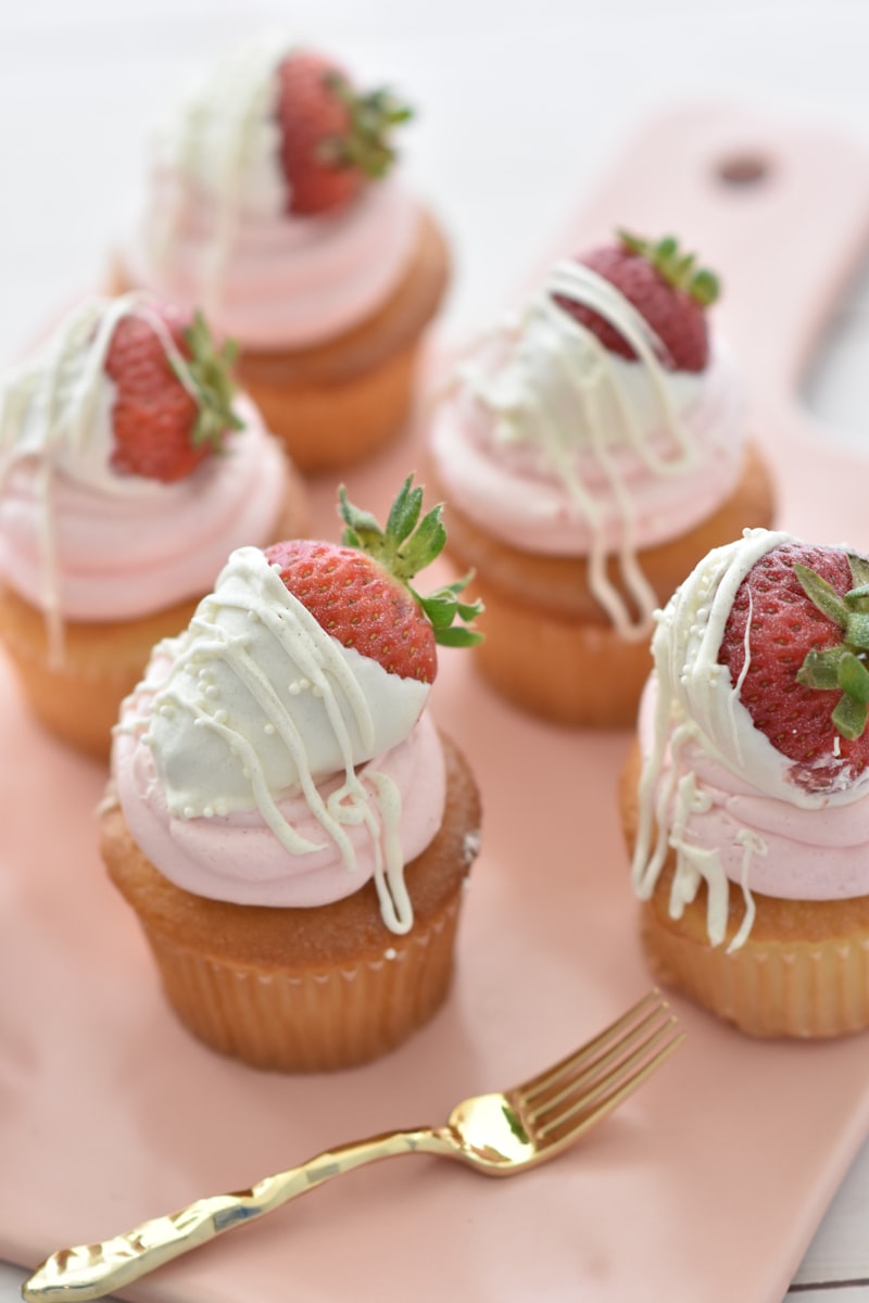 Floral garden themed cupcakes with sugar flowers by Cakes By Holly